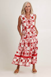 Model Sandy wearing size S of the Lulu Cotton Maxi Dress in colour Jemmared (Red), from the front, showing the whole outfit