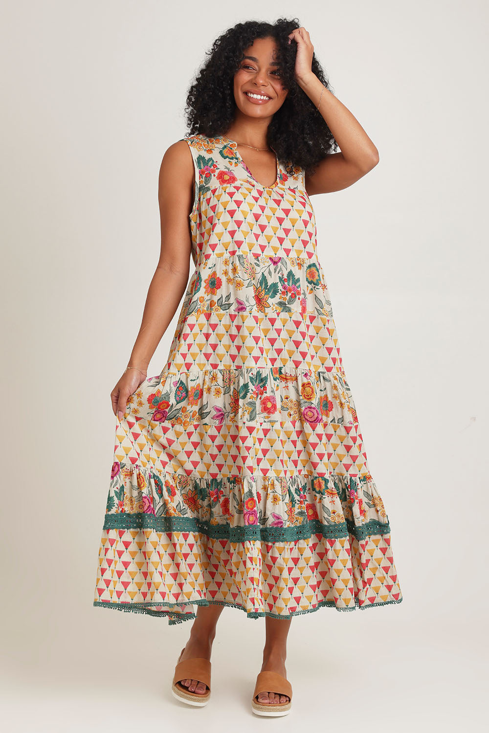 Model Ziara wearing size S of the Lulu Cotton Maxi Dress in colour Luna, from the front, showing the whole outfit