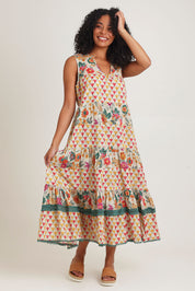 Model Ziara wearing size S of the Lulu Cotton Maxi Dress in colour Luna, from the front, showing the whole outfit