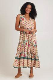 Model Ziara wearing size S of the Lulu Cotton Maxi Dress in colour Luna, from the front, showing the whole outfit