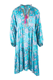 Product shot of the Molly Dress in colour Derpink (Blue), from the front
