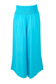 Product shot of the Hendrix Pant in colour Turquoise (Blue), from the back