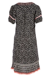 Product shot of the Paradise Dress in colour Black (Black), from the back