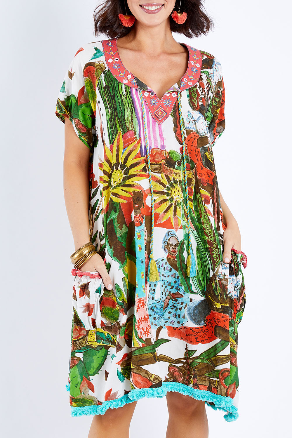 Model Andrea wearing size S of the Sao Paulo Dress in colour Afrcnlady (White), from the front, cropped image