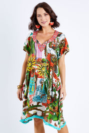Model Andrea wearing size S of the Sao Paulo Dress in colour Afrcnlady (White), from the front, cropped image