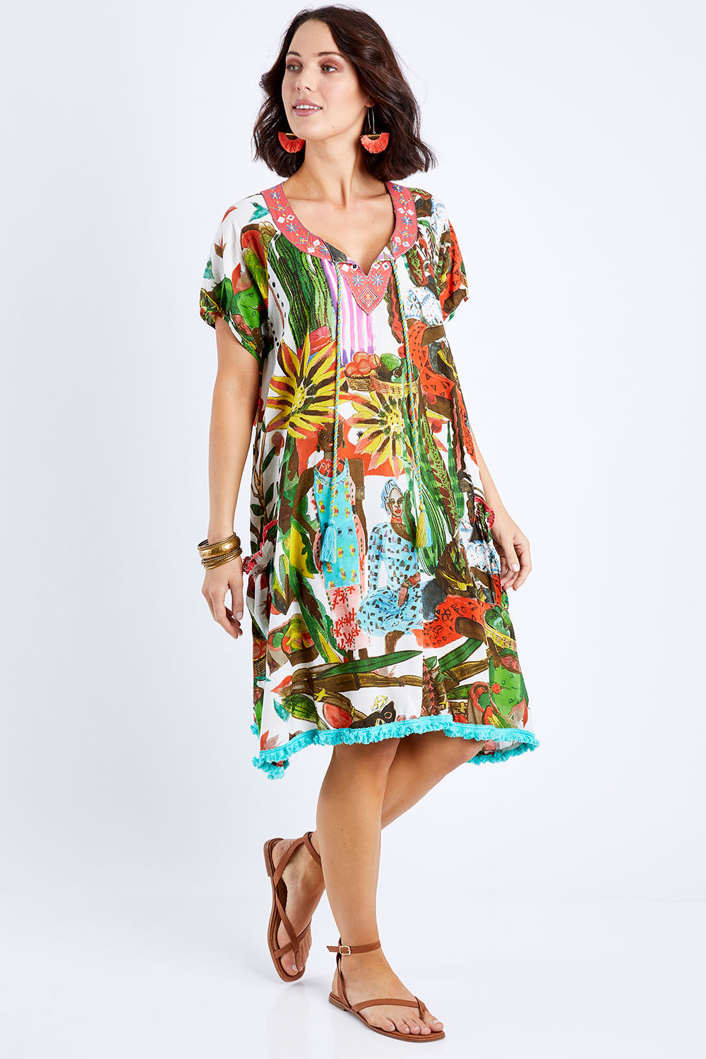 Model Andrea wearing size S of the Sao Paulo Dress in colour Afrcnlady (White), from the front, showing the whole outfit