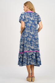 A model wearing the Sao Paulo Cotton Midi Dress in colour Oahu (Blue), from the back