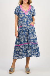 A model wearing the Sao Paulo Cotton Midi Dress in colour Oahu (Blue), from the front, cropped image