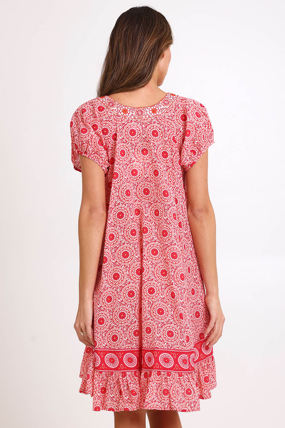 Model Madelinec wearing size 10 of the Sao Paulo Cotton Dress – Jasminewhite in colour Jasminewhite, from the back