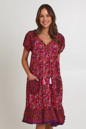 Model Madeline wearing size S of the Sao Paulo Cotton Dress in colour Oasispink (Pink), from the front, cropped image
