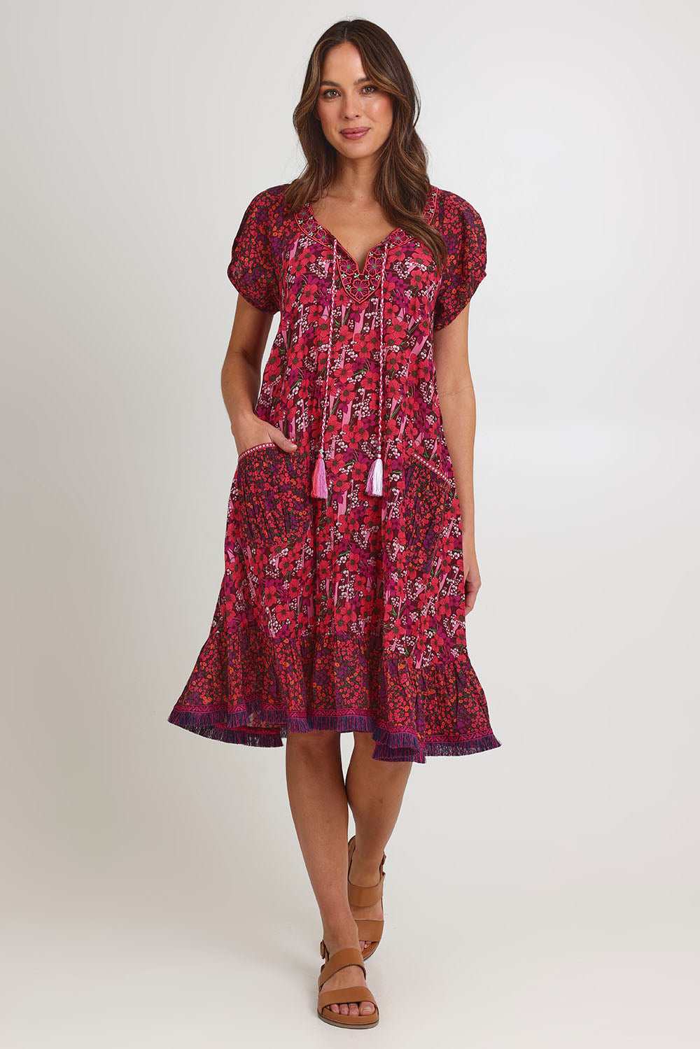 Model Madeline wearing size S of the Sao Paulo Cotton Dress in colour Oasispink (Pink), from the front, showing the whole outfit