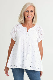 Model Sandy wearing size S of the Sao Paulo Cotton Top in colour Delight (Green), from the front, cropped image