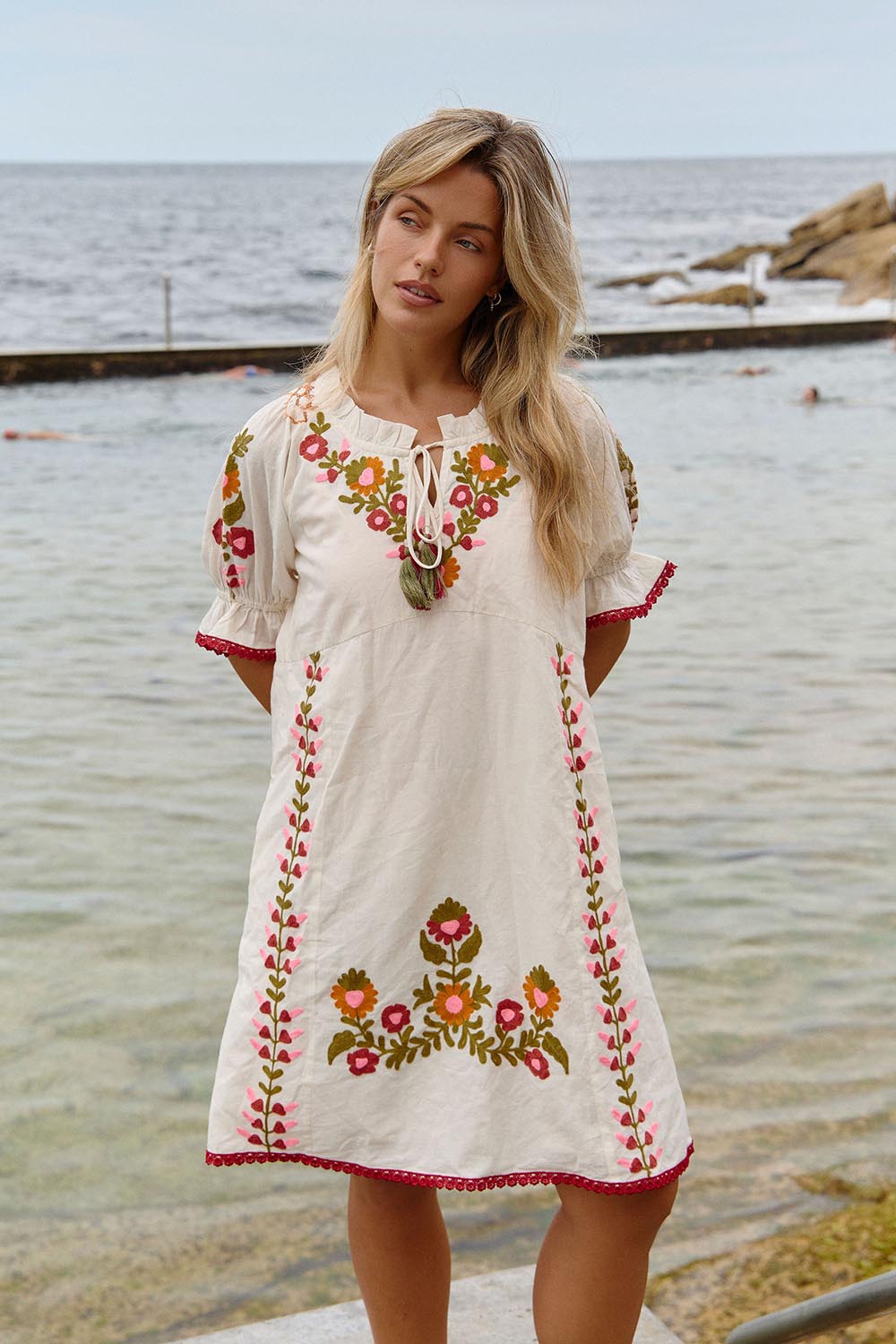 Model Genericm wearing size sample of the Spell Cotton Dress – Acacia in colour Acacia, from the front