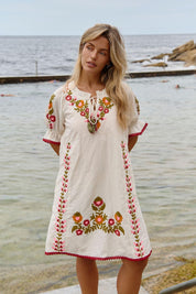 Model Genericm wearing size sample of the Spell Cotton Dress – Acacia in colour Acacia, from the front