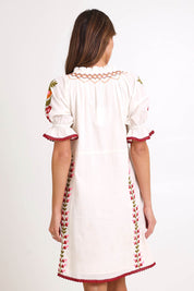 Model Madelinec wearing size 10 of the Spell Cotton Dress – Acacia in colour Acacia, from the back