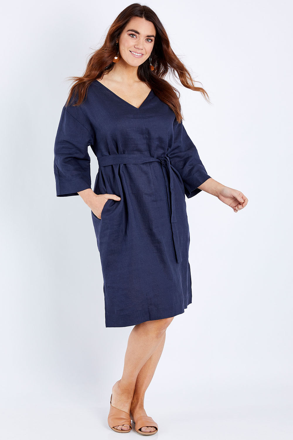 Model Laura wearing size 14 of the Linen Reversible Shift Dress in colour Ocean (Blue), from the front, showing the whole outfit