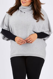 Model Mae wearing size XXL of the Natural Swing Kimono in colour Dove (Grey), from the front, cropped image