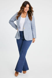 Model Laura wearing size 14 of the Cotton Linen Longline Blazer in colour Chambray (Blue), from the front, showing the whole outfit
