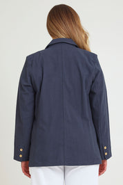 Model Chanel wearing size 16 of the Cotton Linen Longline Blazer in colour Navy (Blue), from the back