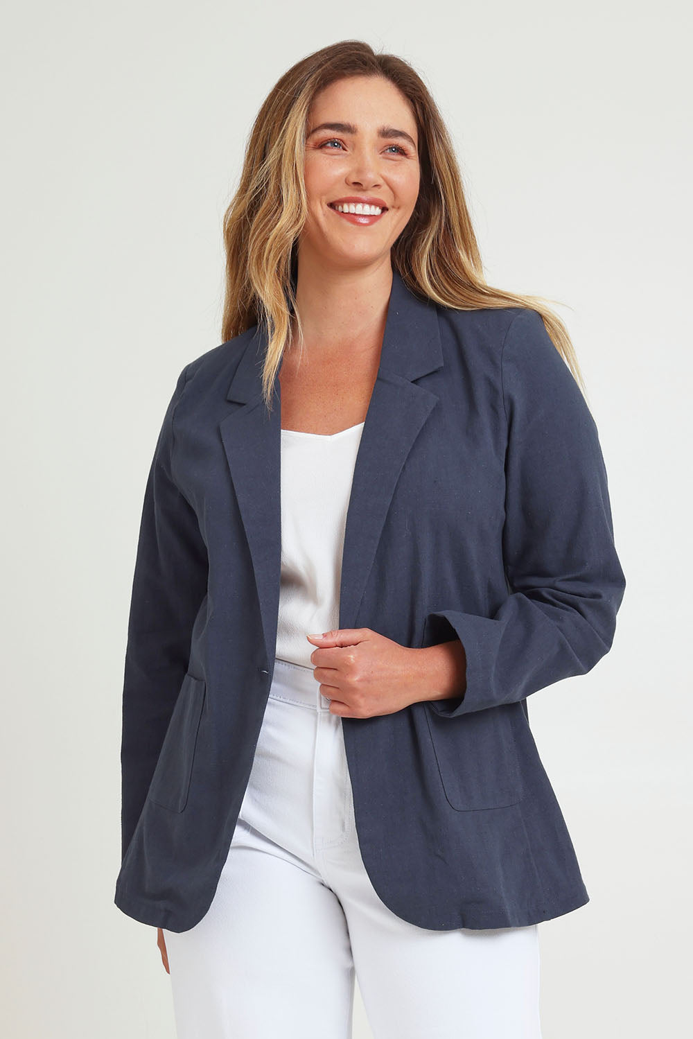 Model Chanel wearing size 16 of the Cotton Linen Longline Blazer in colour Navy (Blue), from the front, cropped image