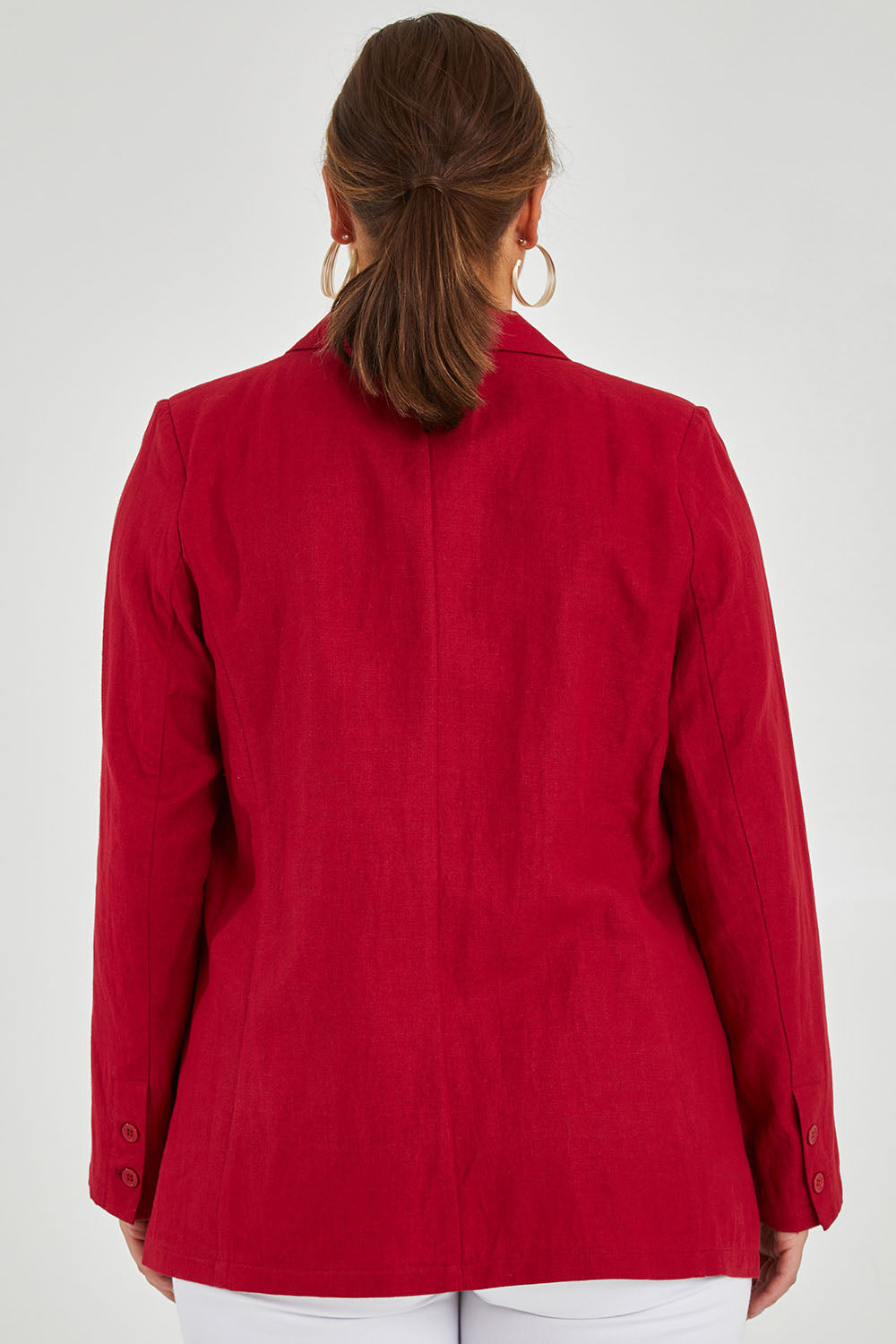 Model Monique wearing size 14 of the Cotton Linen Longline Blazer in colour Red (Red), from the back