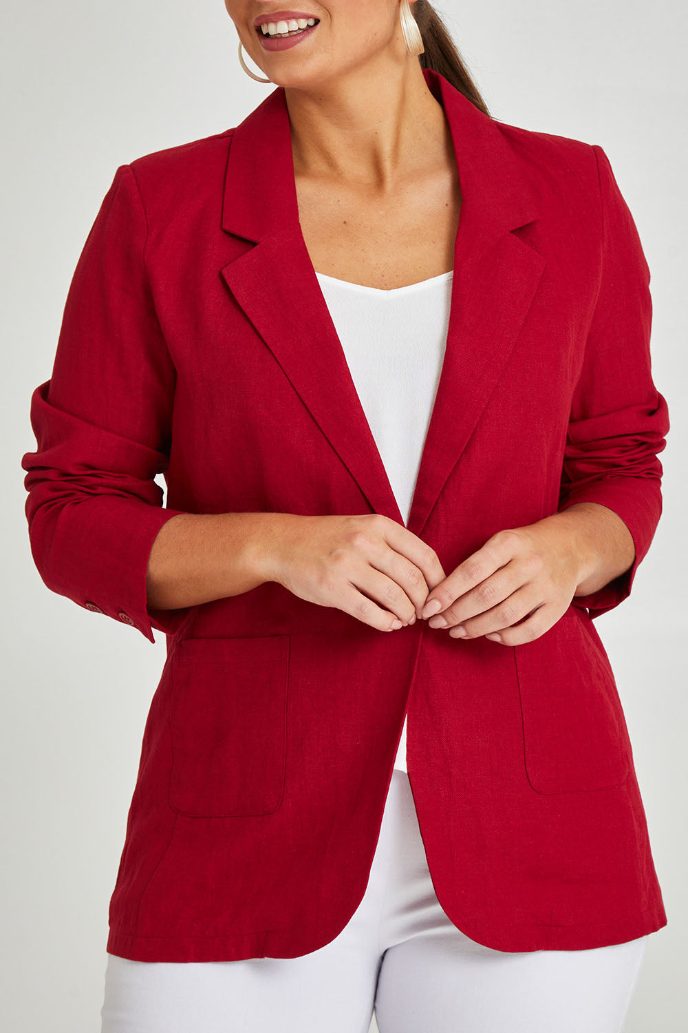Model Monique wearing size 14 of the Cotton Linen Longline Blazer in colour Red (Red), from the front, cropped image