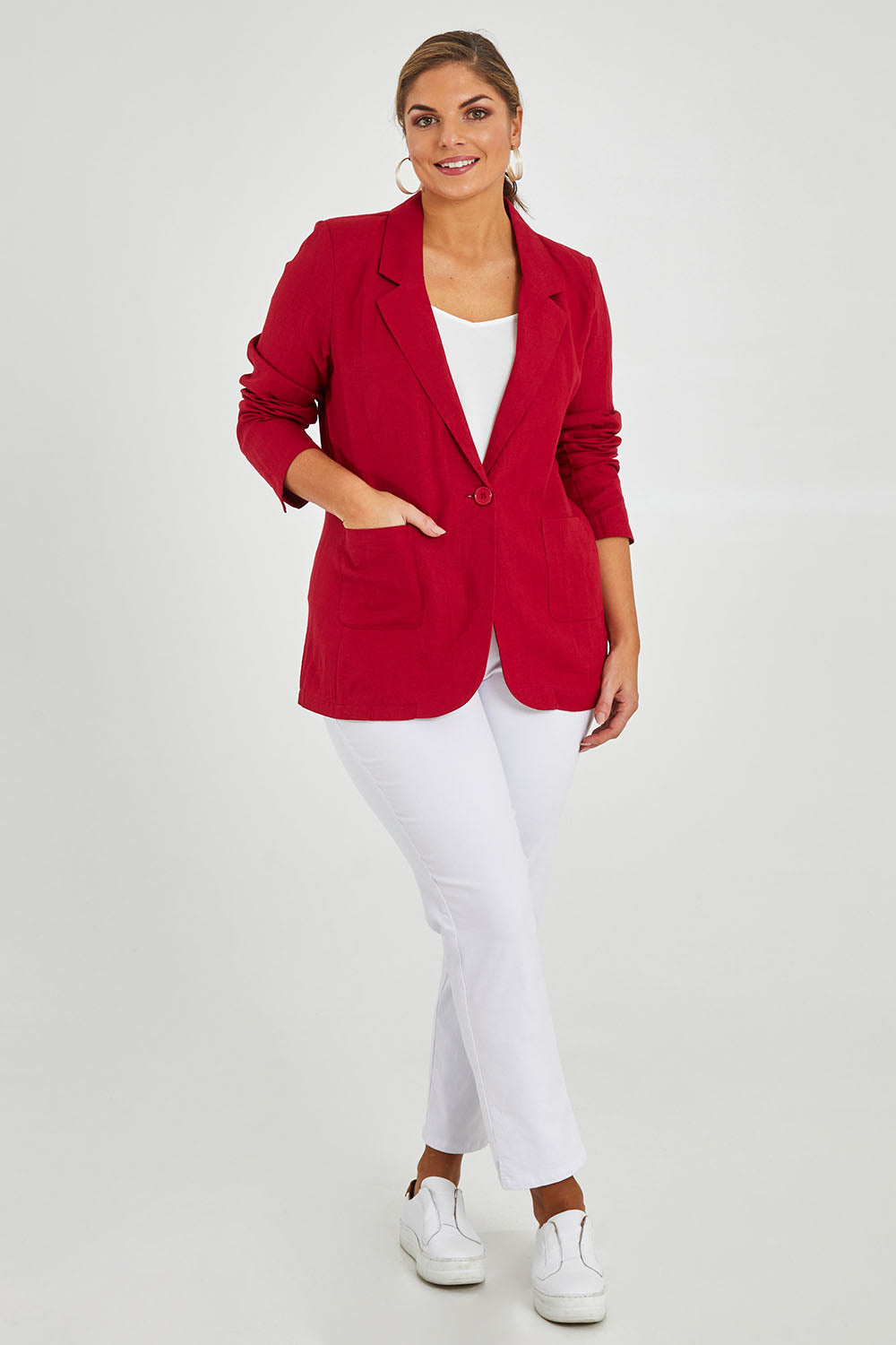 Model Monique wearing size 14 of the Cotton Linen Longline Blazer in colour Red (Red), from the front, showing the whole outfit