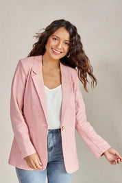 Model Tahneei wearing size 10 of the Cotton Linen Longline Blazer – Softblush in colour Softblush, in a cropped view