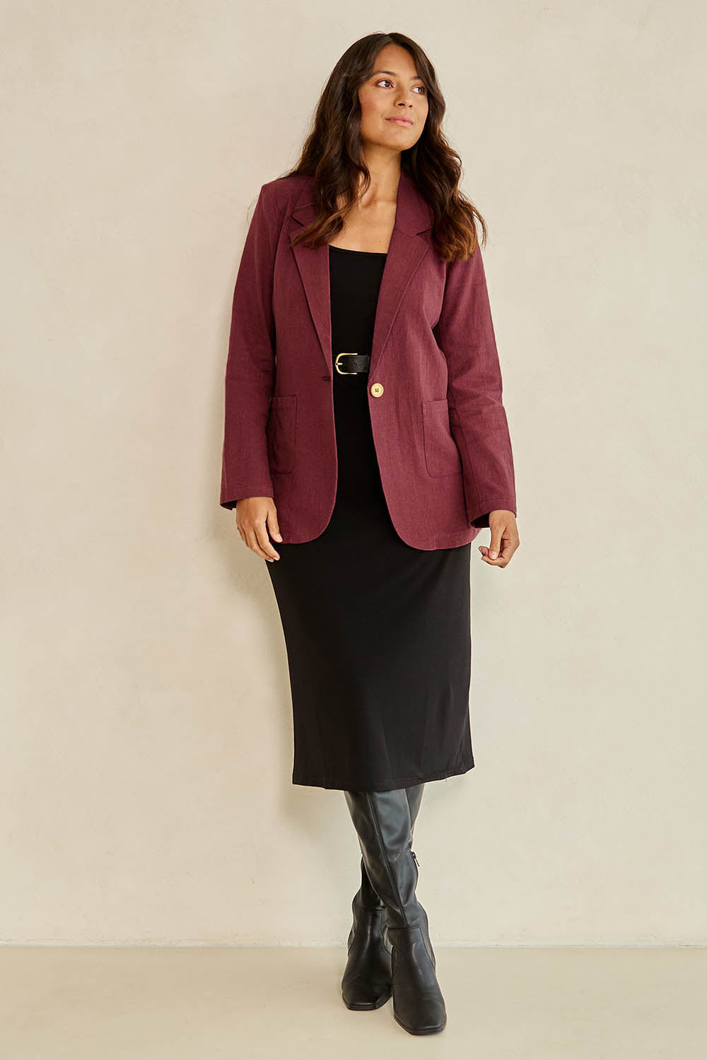 Model Tahnee wearing size 10 of the Cotton Linen Longline Blazer in colour Wine (Red), from the front, showing the whole outfit