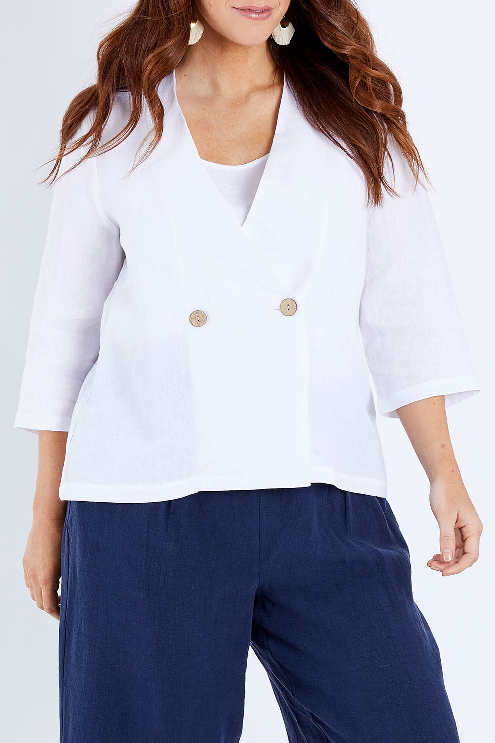 Model Laura wearing size 14 of the Linen 3/4 Sleeve Blazer in colour Meringue (White), from the front, cropped image