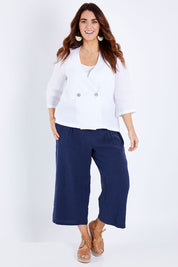 Model Laura wearing size 14 of the Linen 3/4 Sleeve Blazer in colour Meringue (White), from the front, showing the whole outfit