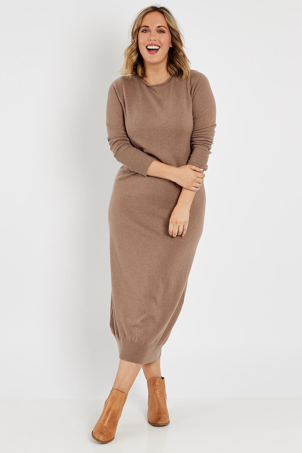 Model Jess wearing size L of the Cotton Cashmere Knit Dress in colour Timberwolf, from the front, showing the whole outfit