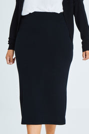 Model Palatina wearing size XL of the Merino Wool Cocoon Cardigan in colour Black (Black), from the front, cropped image