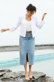 Model Lala wearing size 10 of the Essential Linen Blazer in colour White (White), from the front, showing the whole outfit