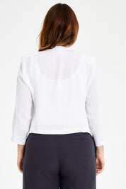 Model Laura wearing size 14 of the Essential Linen Blazer in colour White (White), from the back