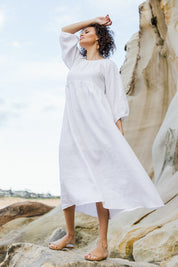Model Lala wearing size 10 of the Linen Gathered Waist Dress in colour White (White), from the front, showing the whole outfit