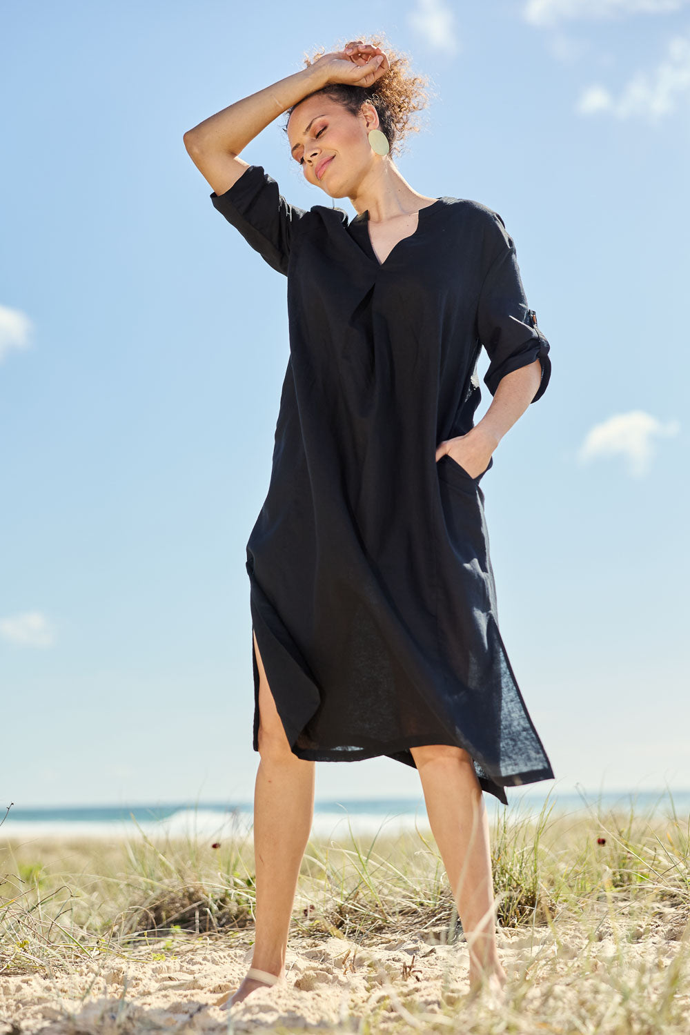 Model Lala wearing size 10 of the Linen Cotton Summer Relaxed Dress in colour Black (Black), from the front, showing the whole outfit