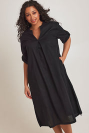Model Terri-Leigh wearing size 14 of the Linen Cotton Summer Relaxed Dress in colour Black (Black), from the front, cropped image