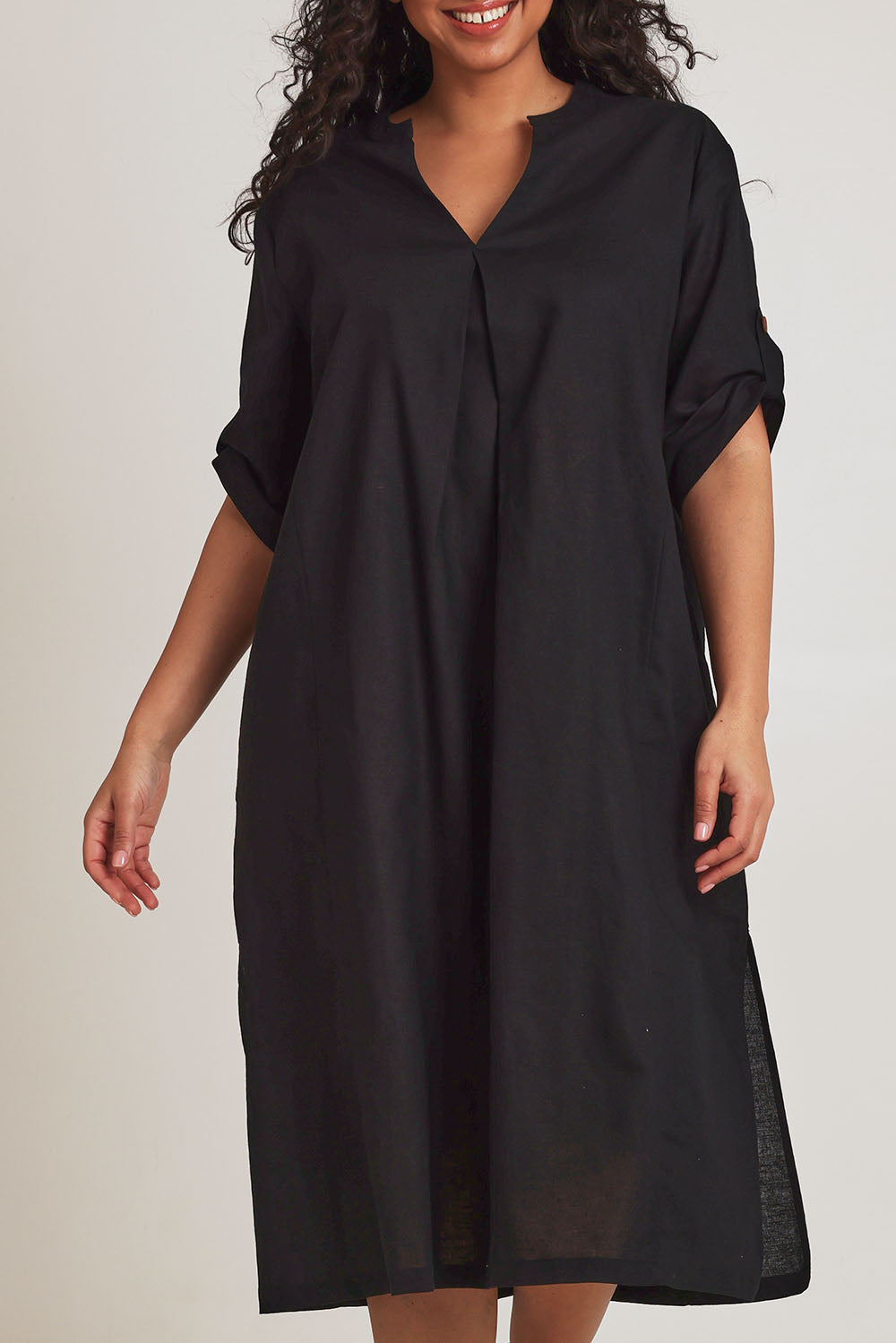 Model Terri-Leigh wearing size 14 of the Linen Cotton Summer Relaxed Dress in colour Black (Black), from the front, cropped image