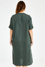 Model Laura wearing size 14 of the Linen Summer Relaxed Dress in colour Green (Green), from the back