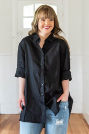 Model Katie wearing size 8 of the Linen Oversized Boyfriend Shirt in colour Black (Black), from the front, showing the whole outfit