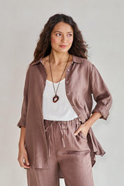 Model Tahneei wearing size 10 of the Linen Oversized Boyfriend Shirt – Coffee in colour Coffee, from an angle