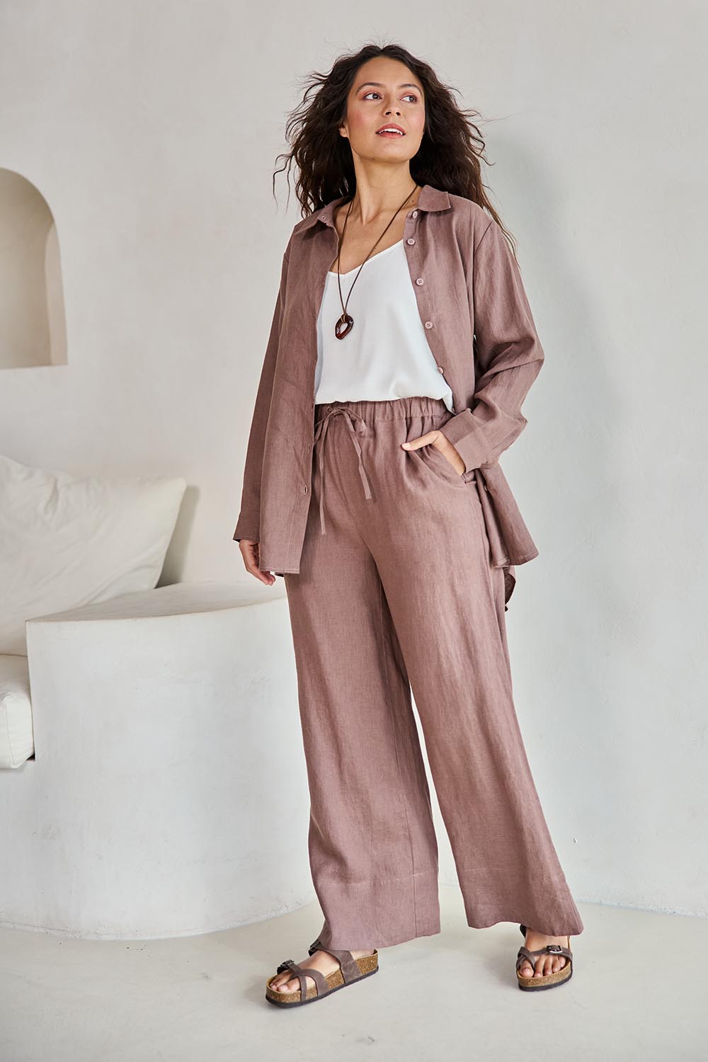 Model Tahneei wearing size 10 of the Linen Oversized Boyfriend Shirt – Coffee in colour Coffee, from the front