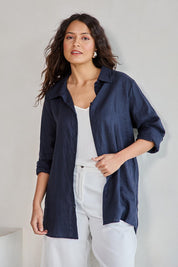Model Tahneei wearing size 10 of the Linen Oversized Boyfriend Shirt - Navy in colour Navy, in a cropped view