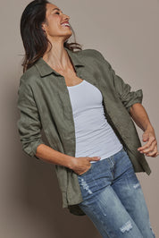 Model Amanda wearing size 10 of the Linen Oversized Boyfriend Shirt in colour Olive (Green), from the front, cropped image