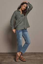 Model Amanda wearing size 10 of the Linen Oversized Boyfriend Shirt in colour Olive (Green), from the front, showing the whole outfit
