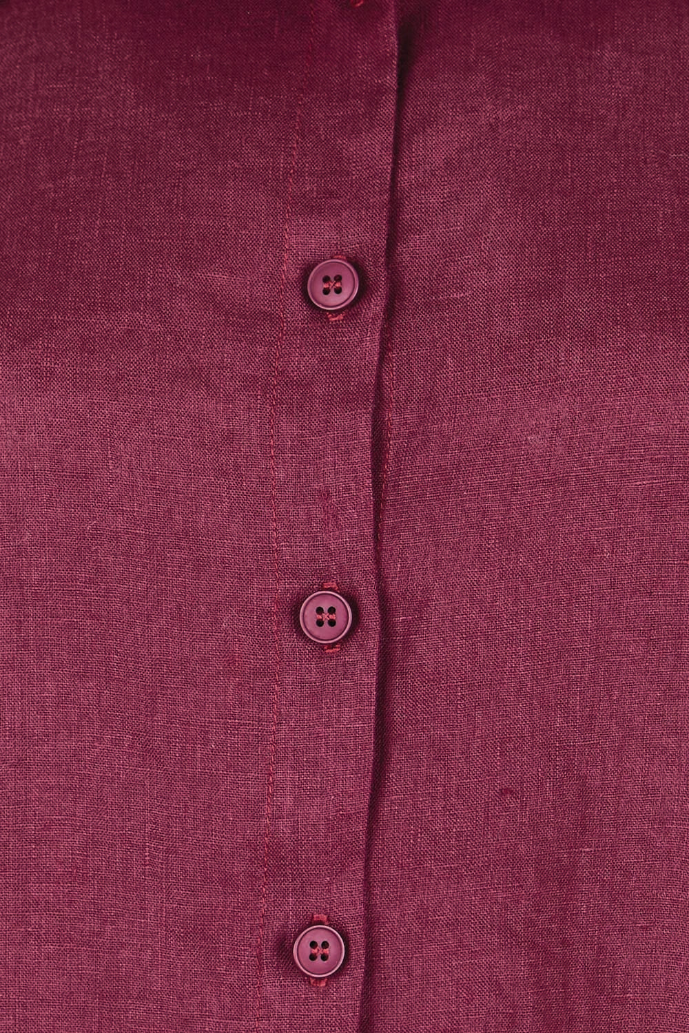 Product shot of the Linen Oversized Boyfriend Shirt – Plum in colour Plum, showing detail