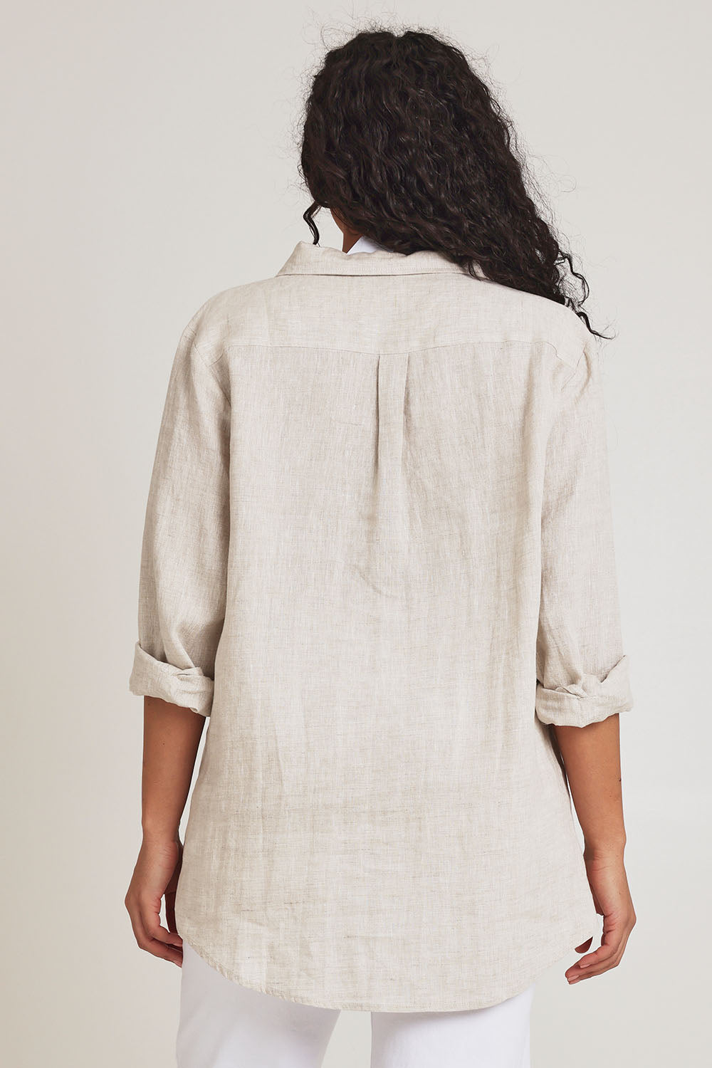 Model Terri-Leigh wearing size 14 of the Linen Oversized Boyfriend Shirt in colour Sand, from the back