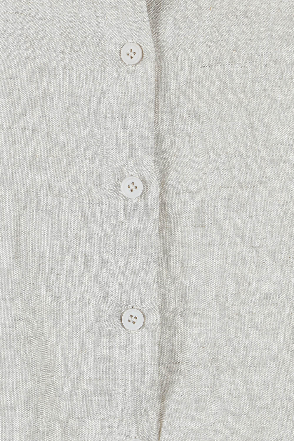 Product shot of the Linen Oversized Boyfriend Shirt in colour Sand, detail