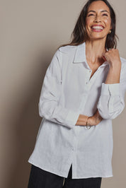 Model Amanda wearing size 10 of the Linen Oversized Boyfriend Shirt in colour White (White), from the front, cropped image